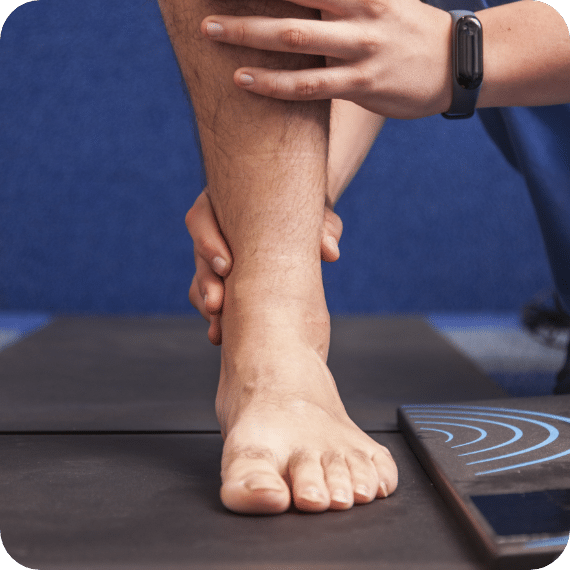 Examining a man's foot at the London Podiatry Centre