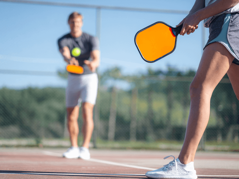 couple playing a pickleball game
